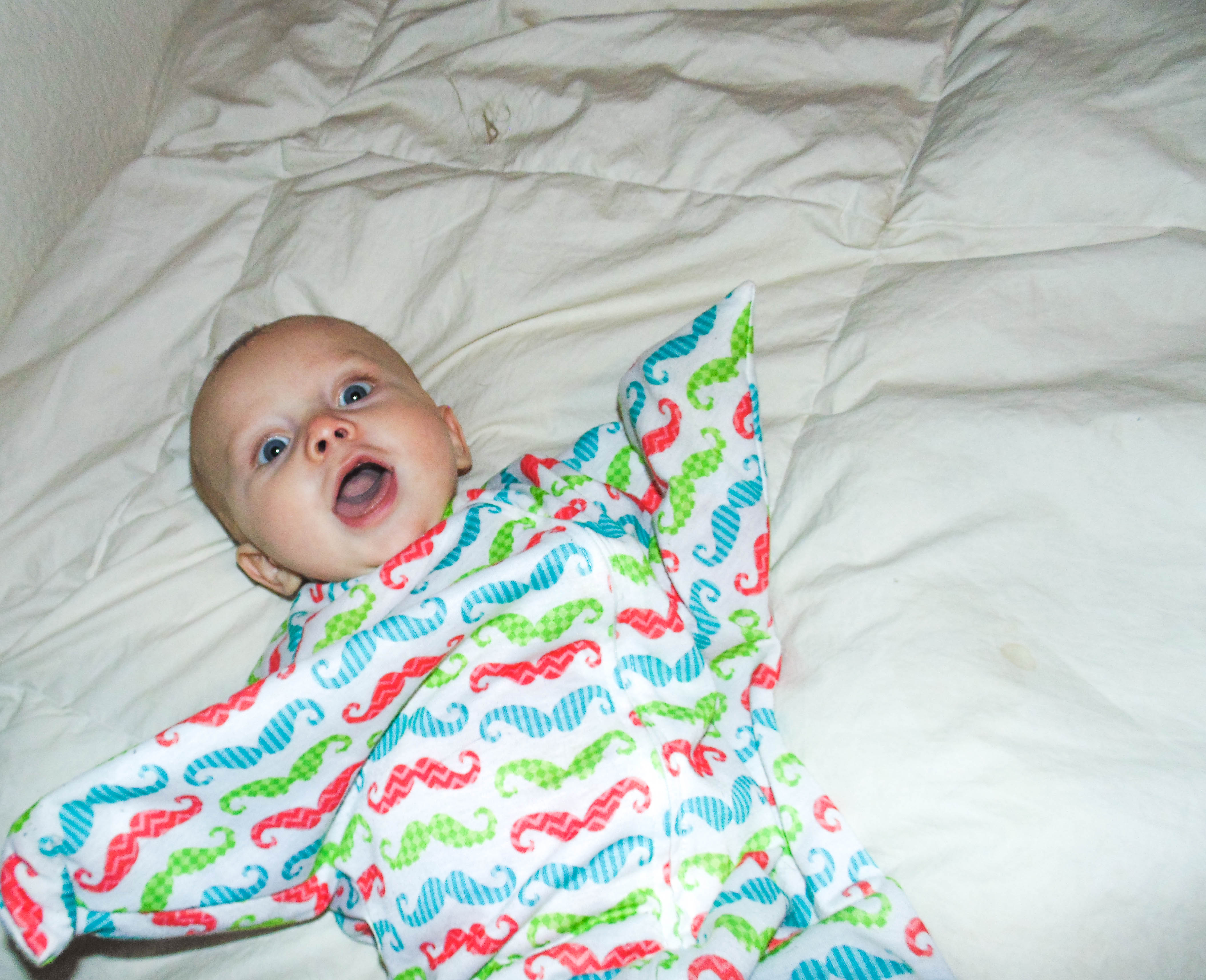 Swaddle transition tips with the Zipadee Zip swaddle featured by popular Denver life and style blogger, All Things Lovely
