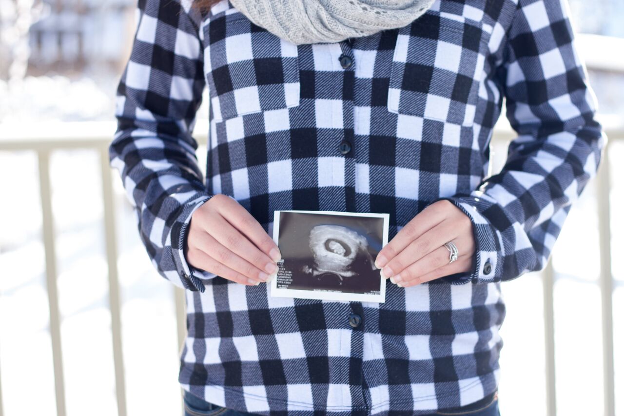 Pregnancy Announcement Ideas featured by popular Denver mom blogger, All Things Lovely