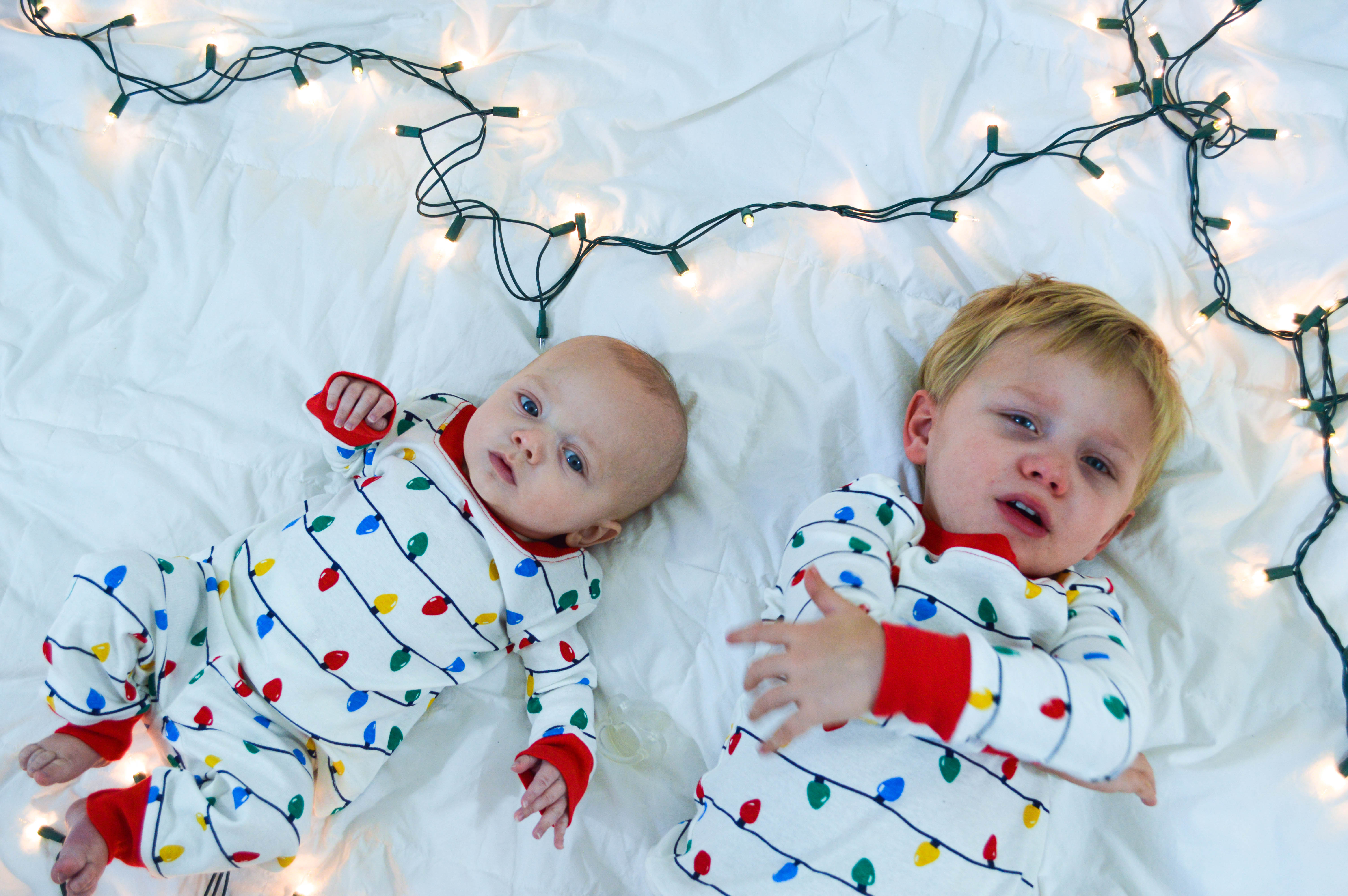 Minted Holiday cards process featured by top Denver lifestyle blog, All Things Lovely: image of 2 children in their Holiday PJs preparing for their holiday photoshoot