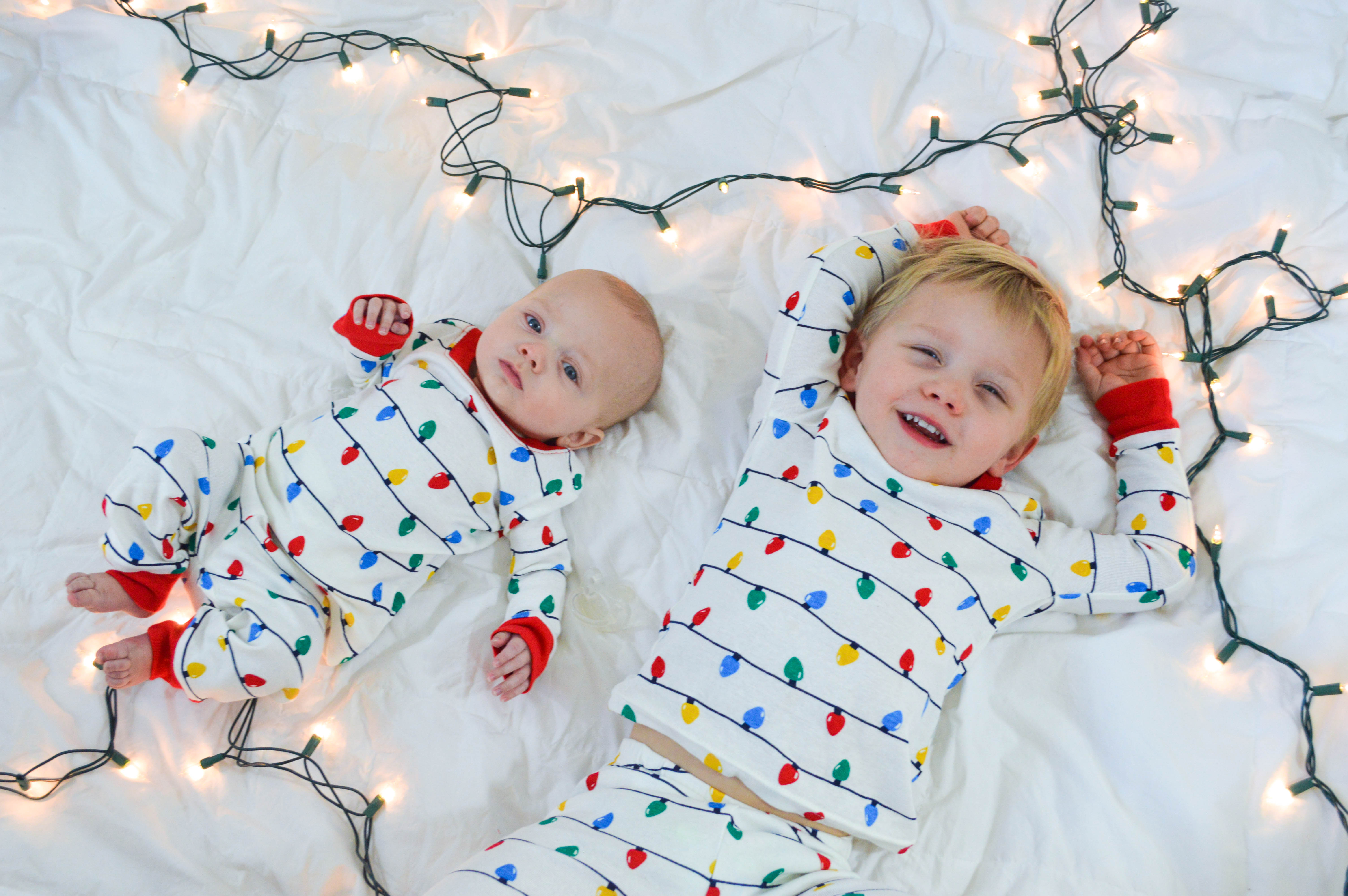 Minted Holiday cards process featured by top Denver lifestyle blog, All Things Lovely: image of 2 children in their Holiday PJs preparing for their holiday photoshoot